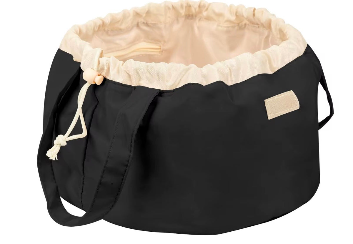 Svart Side Makeup Bag i canvas med dragsko och bärhandtag från Natta Collection.